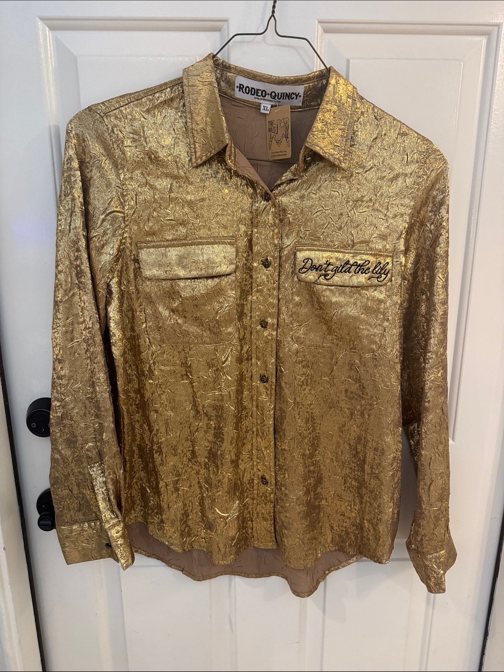 NWT women’s Gold Metallic Button-Up Shirt with “Don’t gold the Lily”.